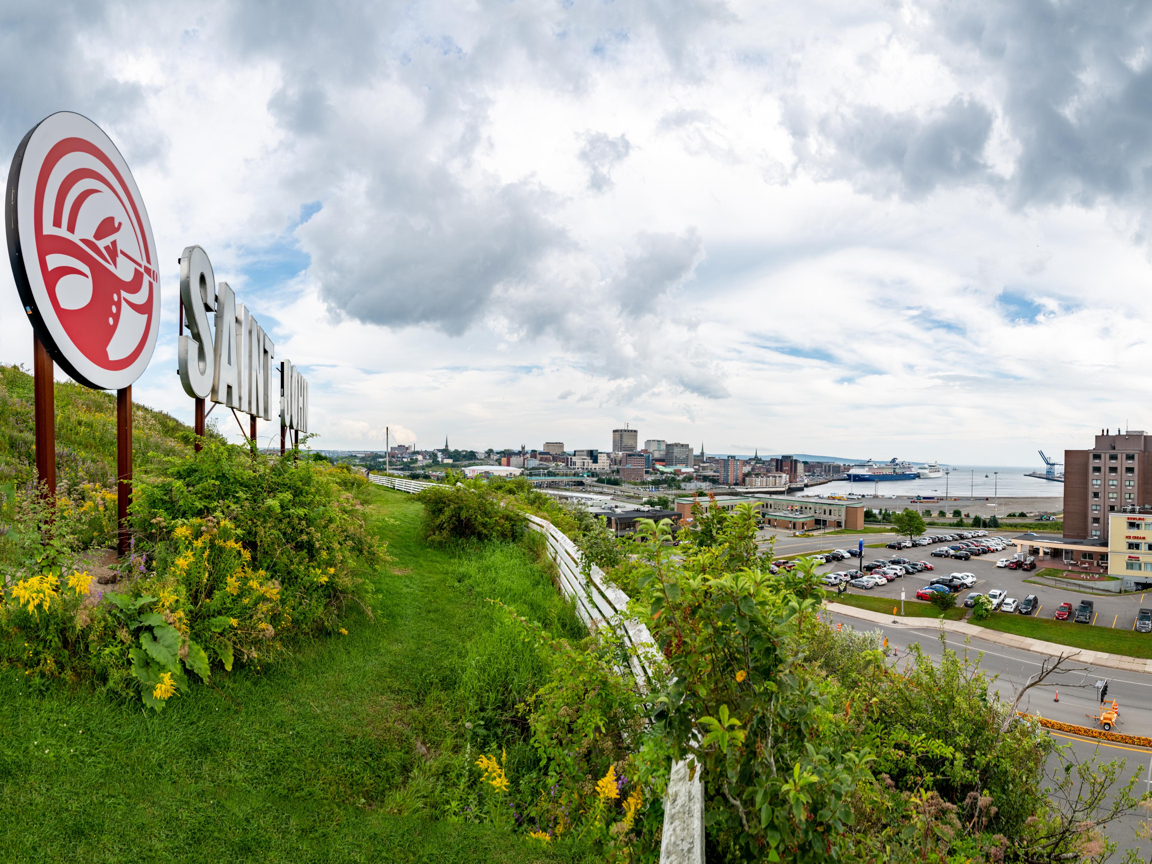 Image of Saint John sign overlooking city