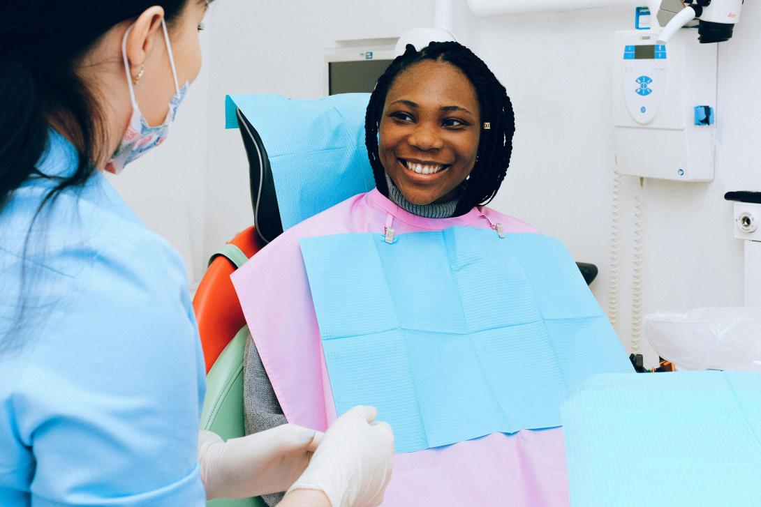 Patient sitting in dentist chair